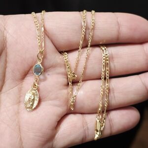 Elegant Gold Necklace with Blue Gemstone